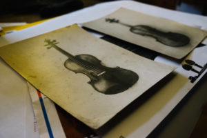 Old Drawings of Violins on the desk